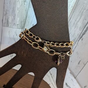 2 Worthington gold charm bracelets